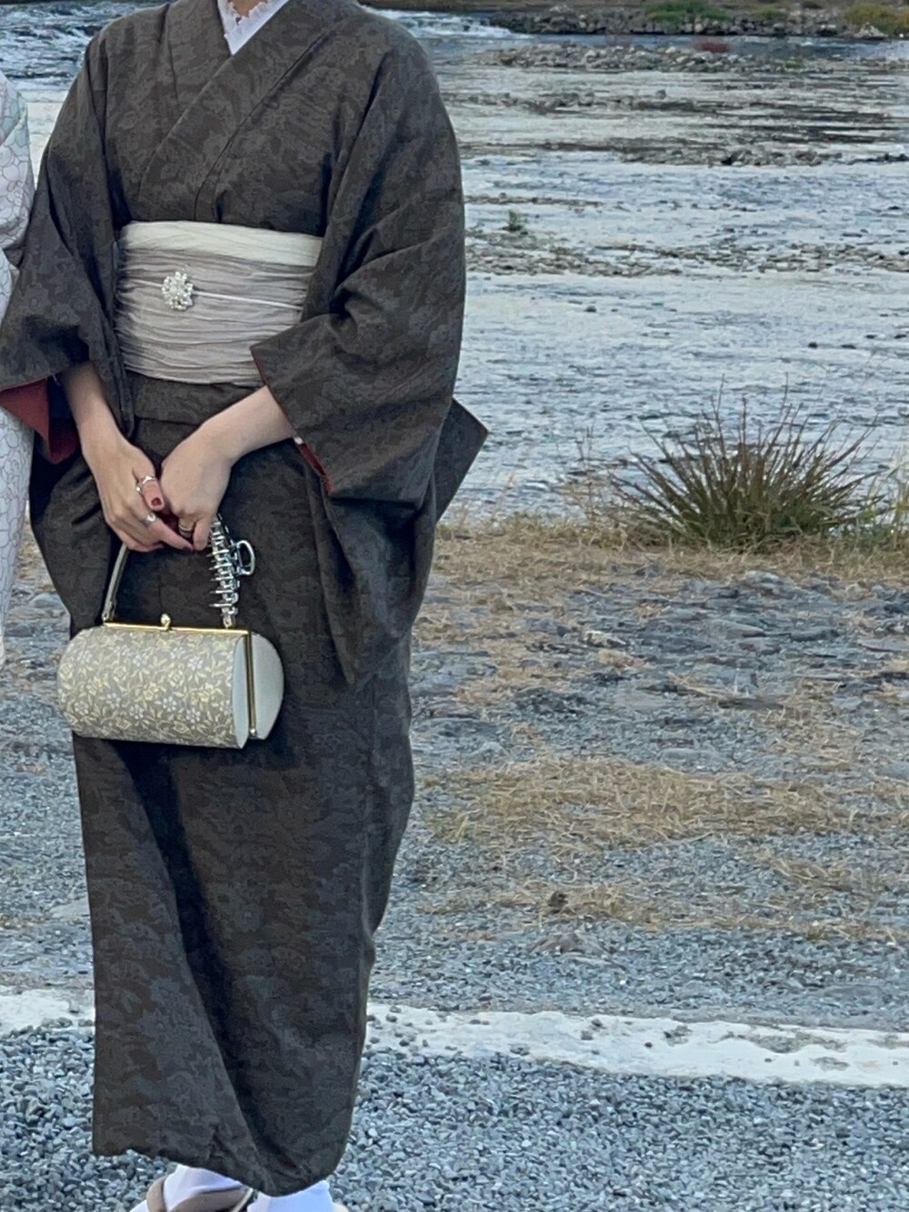 ブラウン系のその他を着用したレディースの冬コーディネートの2枚目の写真