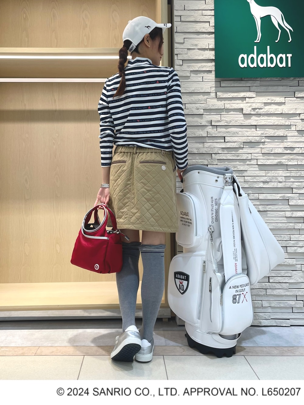 「アダバット、adabat、ゴルフウェア、ゴルフ、スポーツ、ハローキティ」｜「adabatの【撥水加工／防風】キルト素材 ウエストゴムスカート（スカート、イエロー系）」を使った、Hさん（レディース・160cm）の秋コーディネートの3枚目の写真