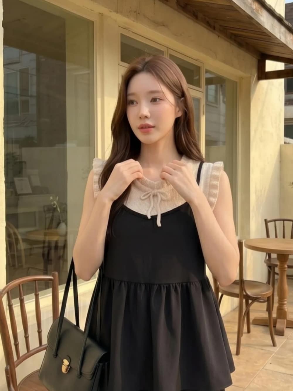 ブラック系のワンピース/ドレスを着用したレディースの夏コーディネートの2枚目の写真