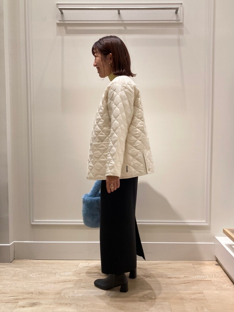 「アウター、ニット、ニットコーデ、スカート、タイトスカート、スカートスタイル、ブーツ、Traditional Weatherwear、キルティングジャケット、休日スタイル、きれいめカジュアル、お出かけコーデ、シンプルコーデ、ブーツスタイル、カラーニット」｜「NOLLEY’SのMUSICハイネックプルオーバーニット（ニット/セーター、イエロー系）」を使った、nol  komatsubaraさん（レディース・159cm）の秋コーディネートの5枚目の写真