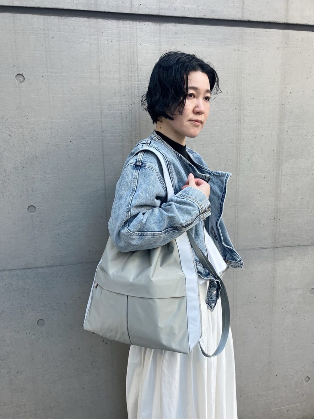 グリーン系のバックパック/リュックを着用したレディースの冬コーディネートの4枚目の写真