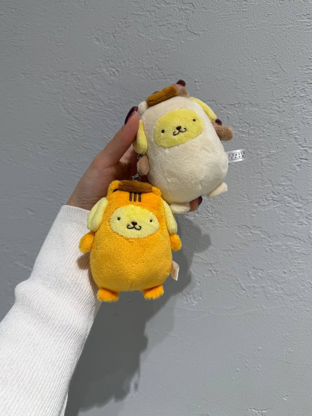 その他のキーホルダーを着用したレディースの春コーディネートの3枚目の写真