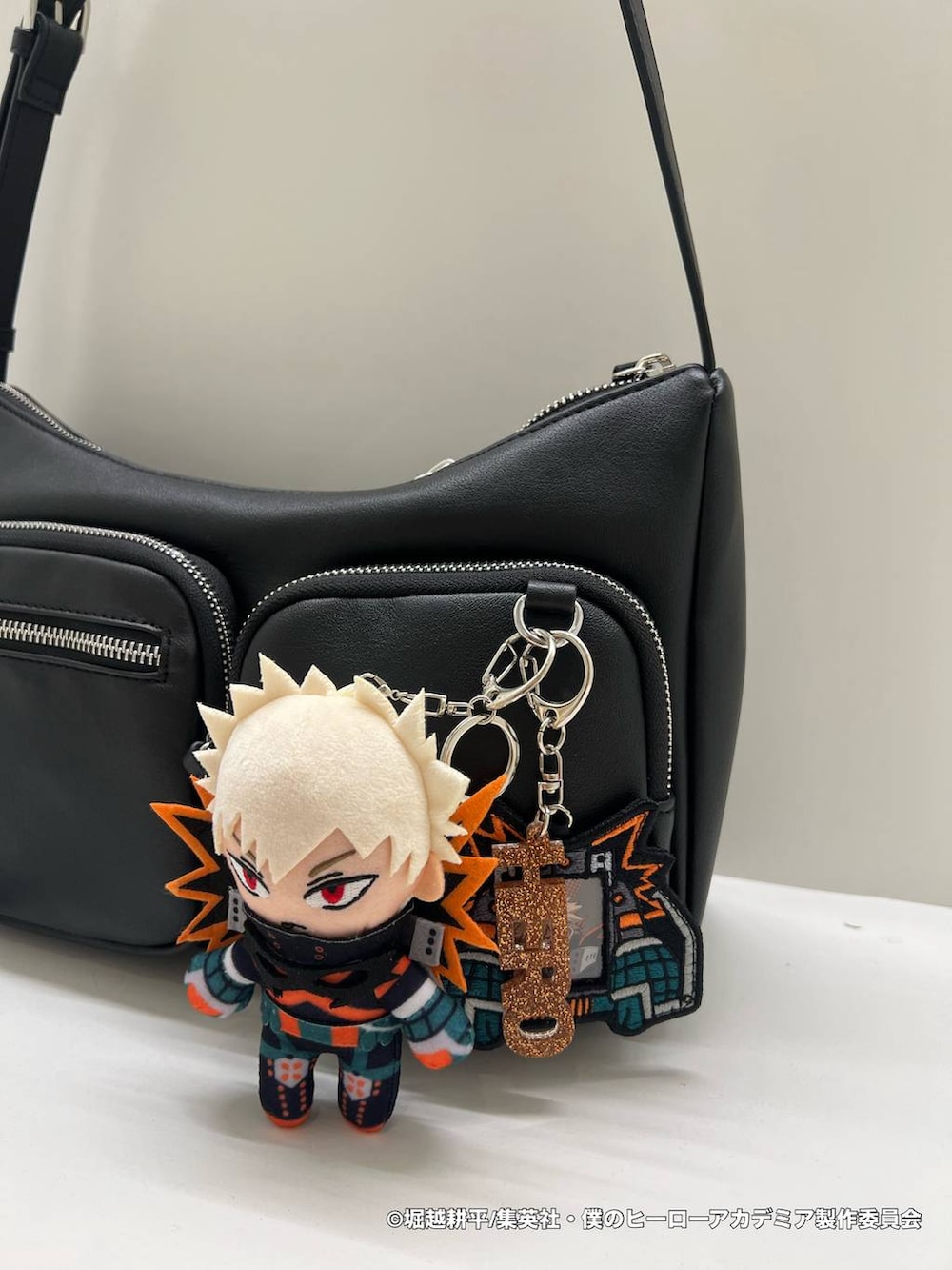 その他のステッカー/テープ、その他のポーチ、その他のキーホルダーを着用したレディースの秋コーディネートの4枚目の写真