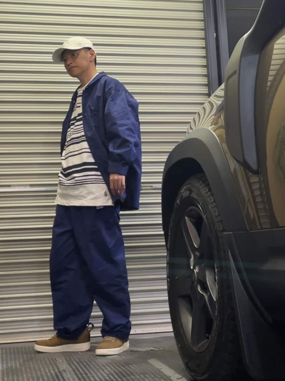 「セットアップ、ブーツ、ボーダー、キャップ、ワーク、ワークパンツ、ワークジャケット、フレンチブルー」|「AIR FORCE 1 LOWのAIR FORCE 1 LOW CARHARTT WIP ALE BROWN(スニーカー、ブラウン系)」を使った、クロ🐑さん(メンズ・168cm)の秋コーディネートの3枚目の写真