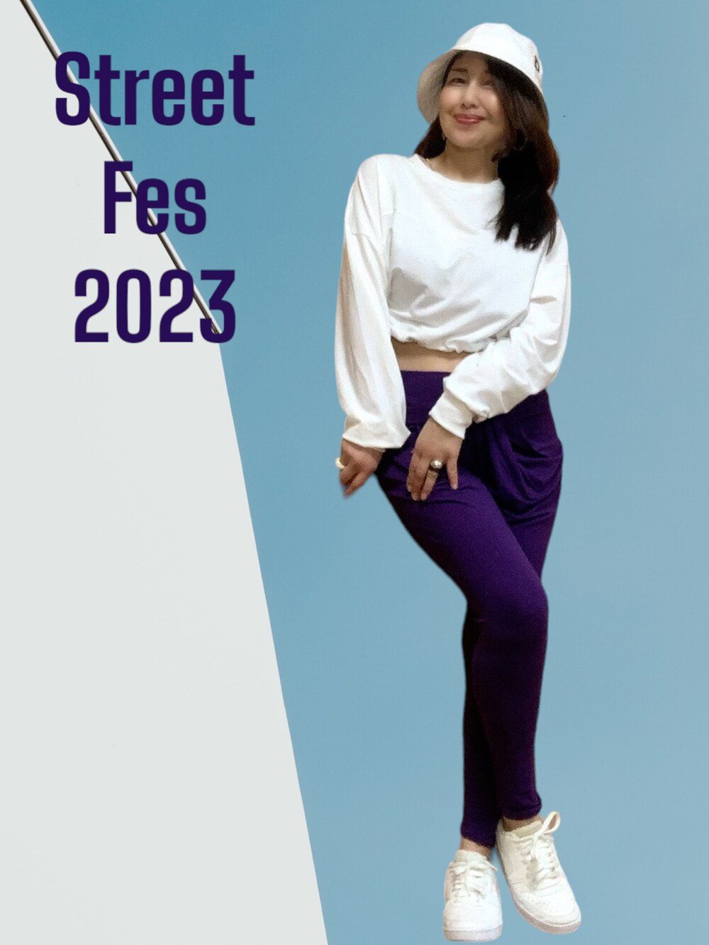 ホワイト系のトップス、ホワイト系のスニーカー、パープル系のパンツを着用したレディースの冬コーディネートの2枚目の写真