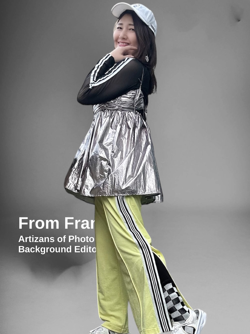 シルバー系のキャミソール、ブラック系のトップス、イエロー系のその他パンツを着用したレディースの春コーディネートの3枚目の写真