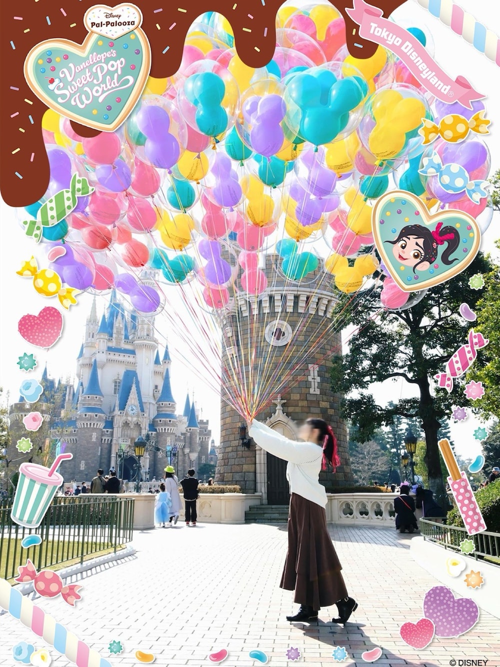 グリーン系のカーディガン/ボレロ、ピンク系のニット/セーター、ブラック系のブーツを着用したレディースの秋コーディネートの3枚目の写真