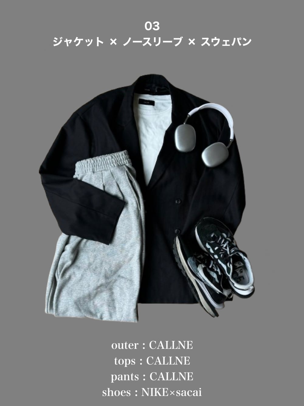 ブルー系のデニムパンツ、ブラック系のローファーを着用したメンズの春コーディネートの4枚目の写真