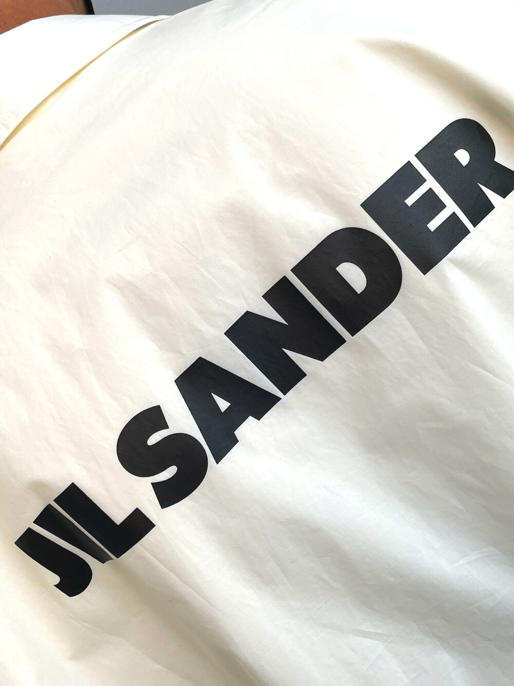 「コーチジャケット、ジルサンダー、JILSANDER」｜「JIL SANDERのアイテム（ブルゾン、ホワイト系）」を使った、Munehiro.Tさん（メンズ・170cm）の春コーディネートの4枚目の写真