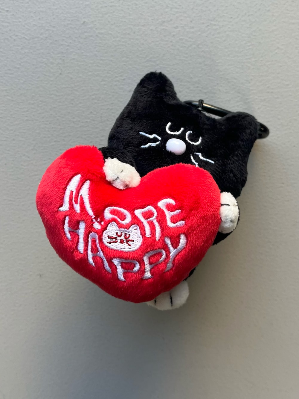 ピンク系のエコバッグ/サブバッグ、ブラック系のチャーム、その他のハンドケア/ハンドクリームを着用したレディースの春コーディネートの2枚目の写真