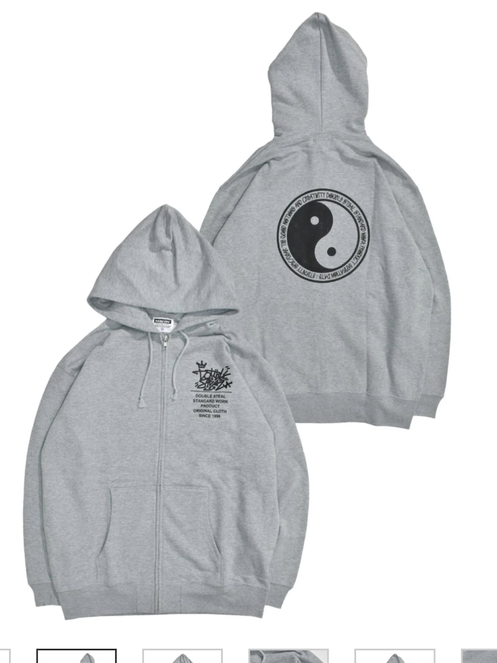 ブラウン系のスニーカー、ブルー系のデニムパンツ、グレー系のナイロンジャケットを着用したメンズの冬コーディネートの3枚目の写真