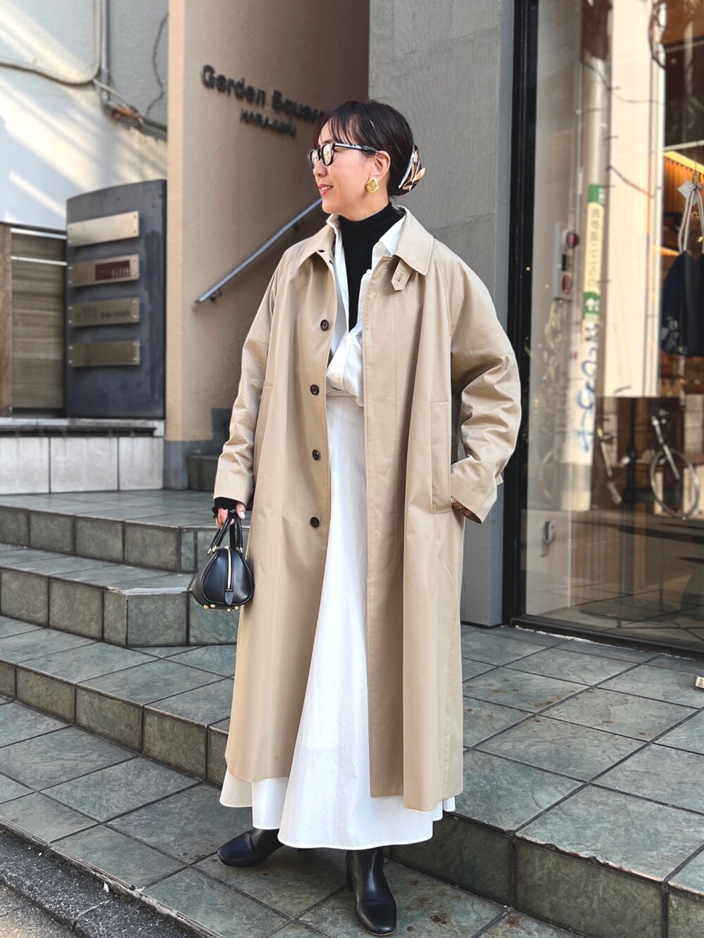 「きれいめカジュアル、大人カジュアル、休日コーデ、大人女子、ロングスカート、高身長コーデ、ステンカラー、バルマカーンコート、アウター、メガネ女子」｜「NOLLEY’Sのブロードタンブラーセミフレアスカート（スカート、ホワイト系）」を使った、nol matsubaさん（レディース・167cm）の冬コーディネートの3枚目の写真