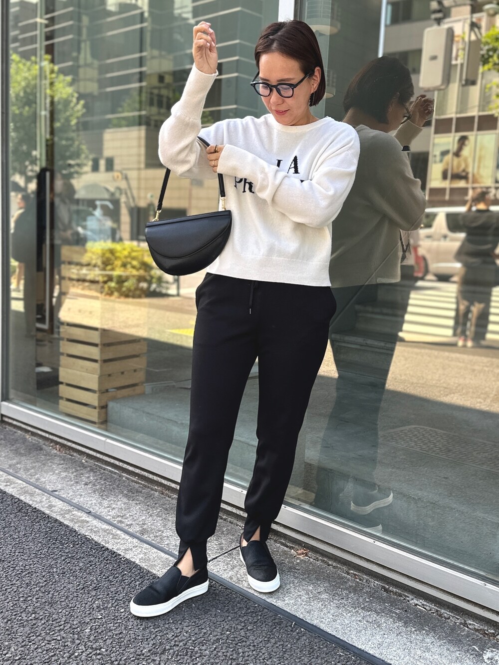 「MOHIの【MOHI/ モヒ】 ◇【WEB限定】 ポニースリッポン（スニーカー、ブラック系）」を使った、nol matsubaさん（レディース・167cm）の夏コーディネートの2枚目の写真