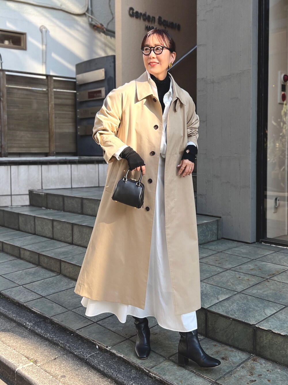 「きれいめカジュアル、大人カジュアル、休日コーデ、大人女子、ロングスカート、高身長コーデ、ステンカラー、バルマカーンコート、アウター、メガネ女子」｜「NOLLEY’Sのブロードタンブラーセミフレアスカート（スカート、ホワイト系）」を使った、nol matsubaさん（レディース・167cm）の冬コーディネートの4枚目の写真