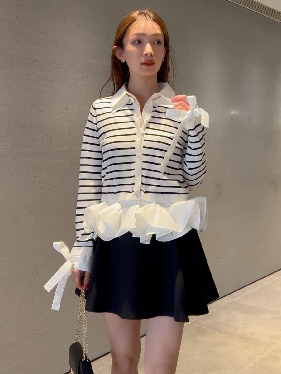 その他のブーツ、ブラック系のブルゾン、ブラック系のその他パンツを着用したレディースの冬コーディネートの2枚目の写真