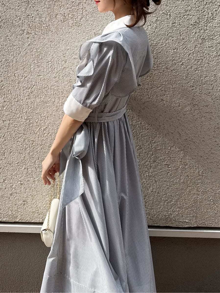 その他のワンピース、ホワイト系のショルダーバッグを着用したレディースの冬コーディネートの4枚目の写真