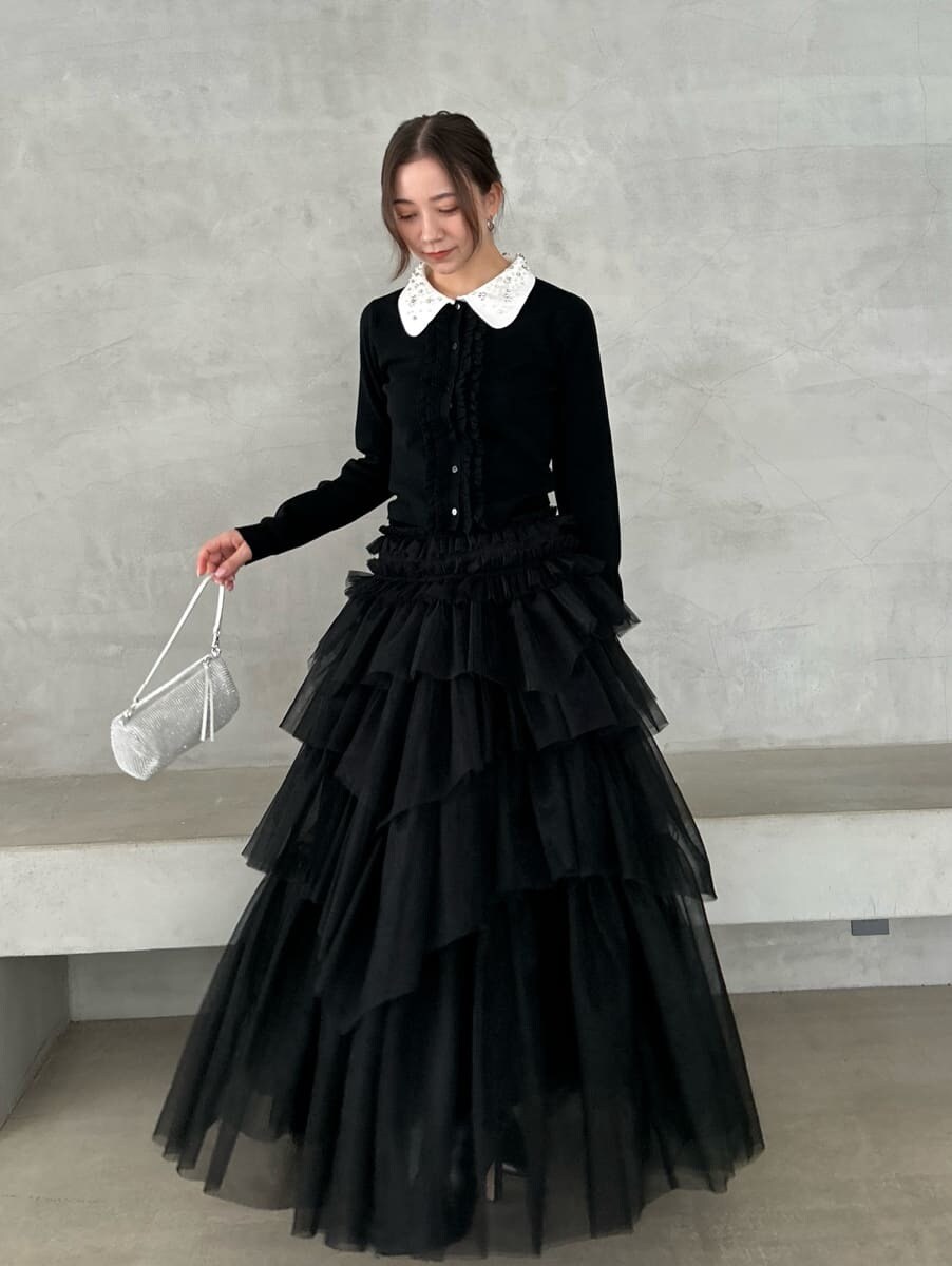 ブラック系のブーツを着用したレディースの冬コーディネートの5枚目の写真