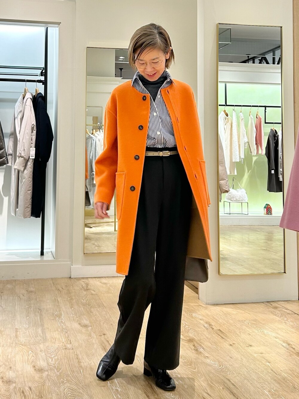 「タートルネック、パンツスタイル、きれいめコーディネート、リバーシブルコート、ノーカラーコート、ストライプシャツ、ウエストイン、高身長コーデ、仕事服」｜「NOLLEY’Sのウォッシャブルタックワイド裏起毛パンツ（その他パンツ、グレー系）」を使った、umezawa_nolさん（レディース・167cm）の冬コーディネートの5枚目の写真