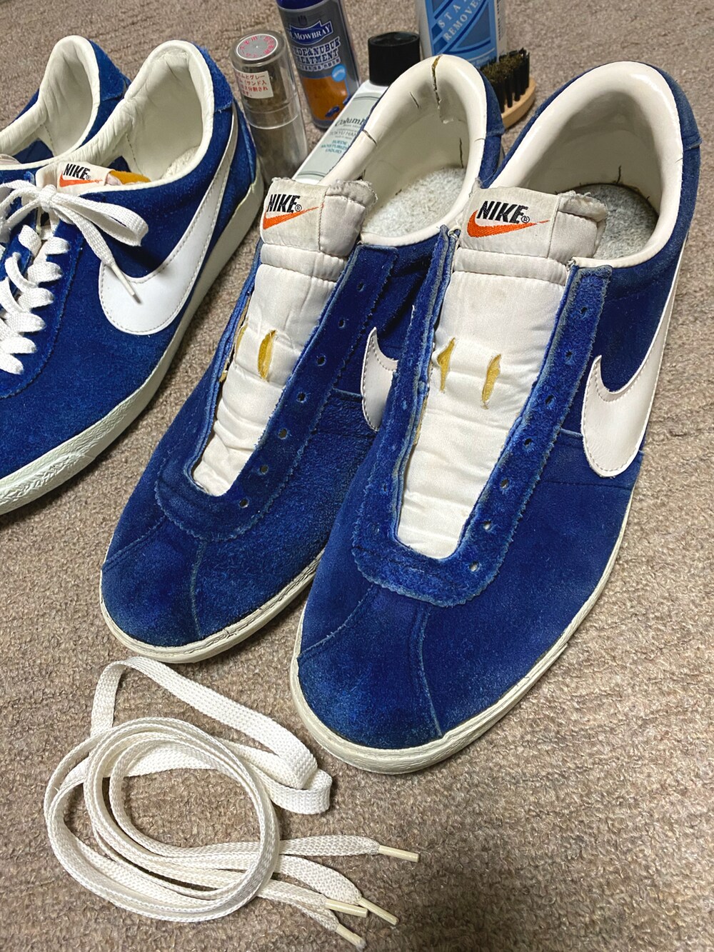 ブルー系のカバーオール、ブルー系のダウンジャケット/コート、ブルー系のシャツ/ブラウスを着用したメンズの冬コーディネートの3枚目の写真