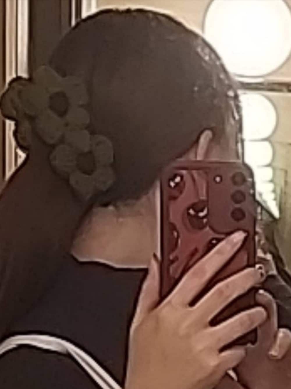 グレー系のニット/セーターを着用したレディースの冬コーディネートの2枚目の写真