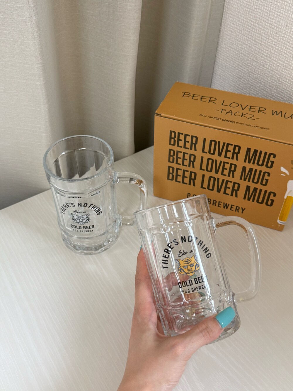 グリーン系のクッション/クッションカバー、その他のグラス/マグカップ/タンブラー、グレー系のキッチンツールを着用したレディースの夏コーディネートの2枚目の写真
