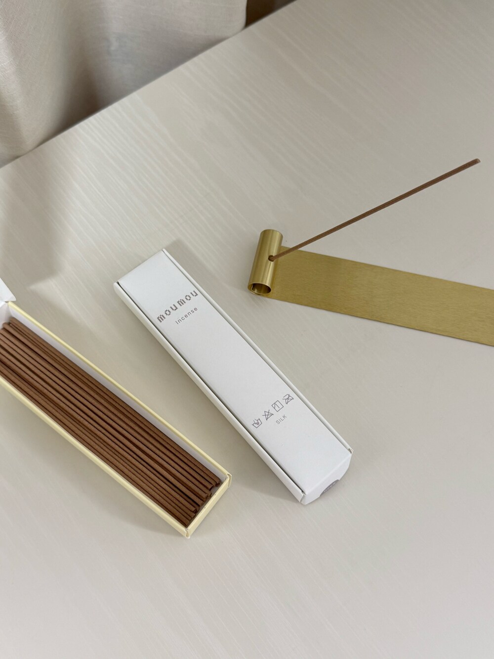 その他のルームフレグランス/お香、ベージュ系のスピーカー、その他のインテリア雑貨を着用したレディースの冬コーディネートの5枚目の写真