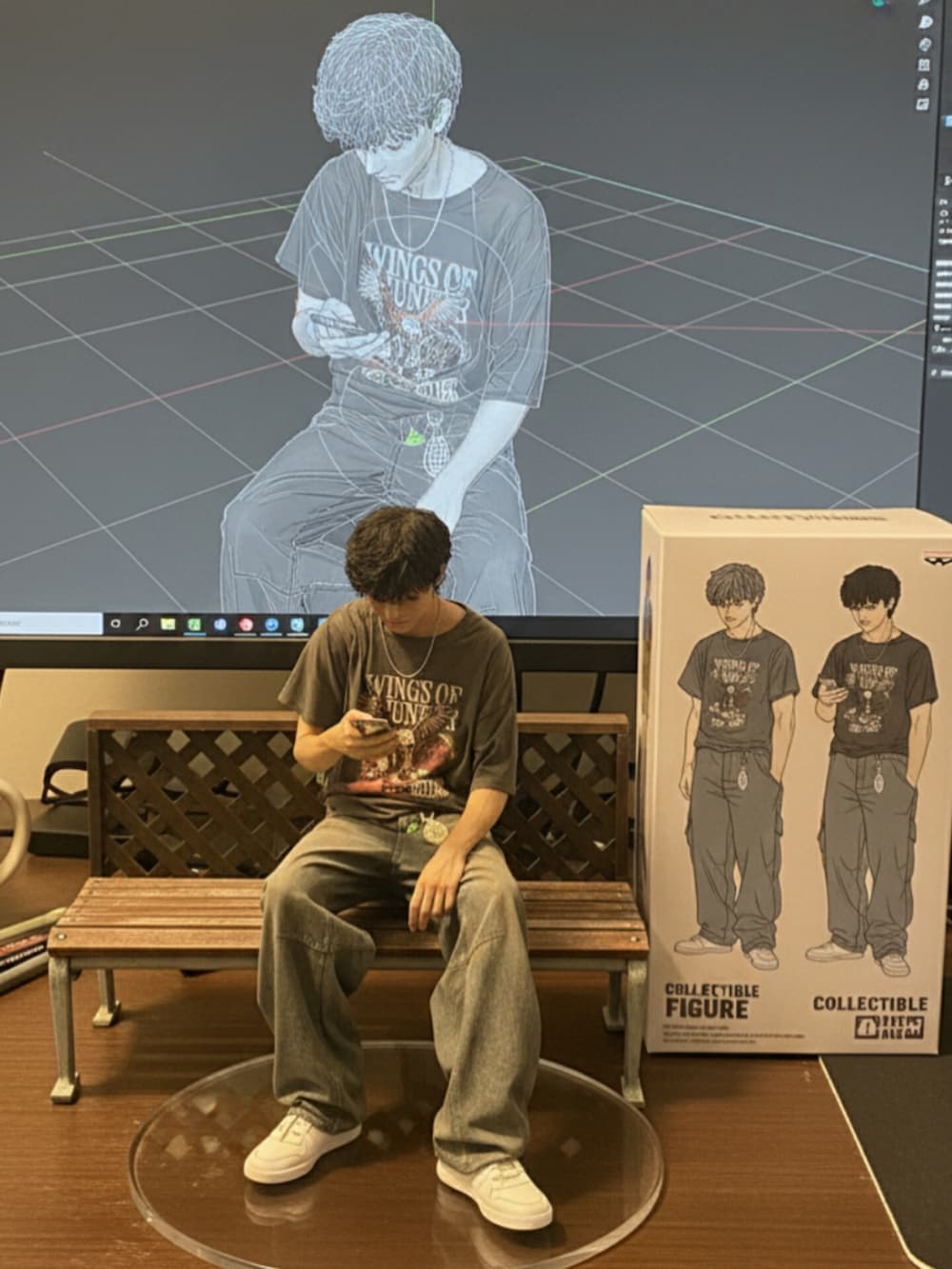 グレー系のTシャツ/カットソー、ブルー系のデニムパンツ、ホワイト系のスニーカーを着用したメンズの秋コーディネートの2枚目の写真