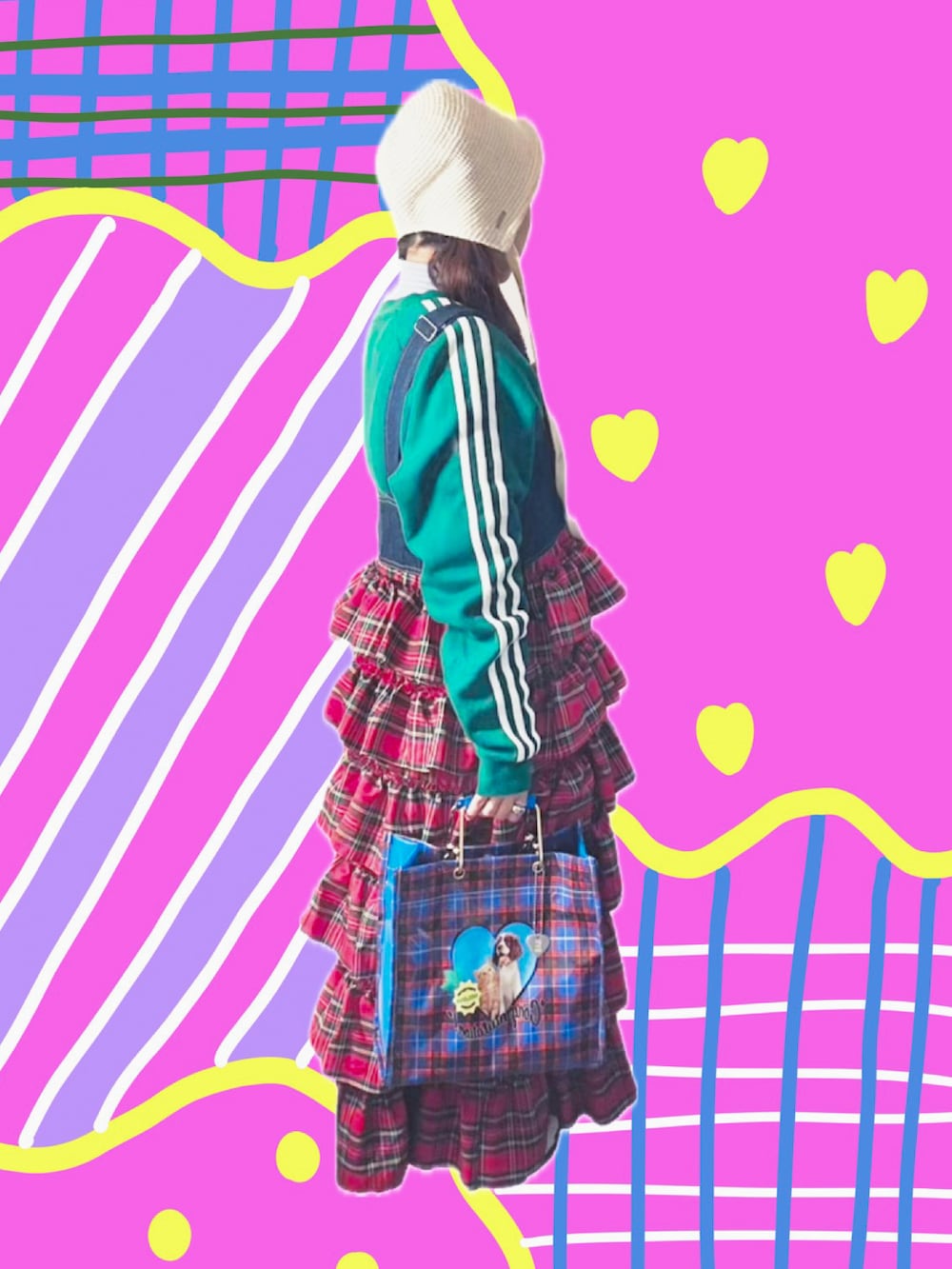 レッド系のジャンパースカート、ブルー系のハンドバッグ、ホワイト系のスニーカーを着用したレディースの春コーディネートの2枚目の写真