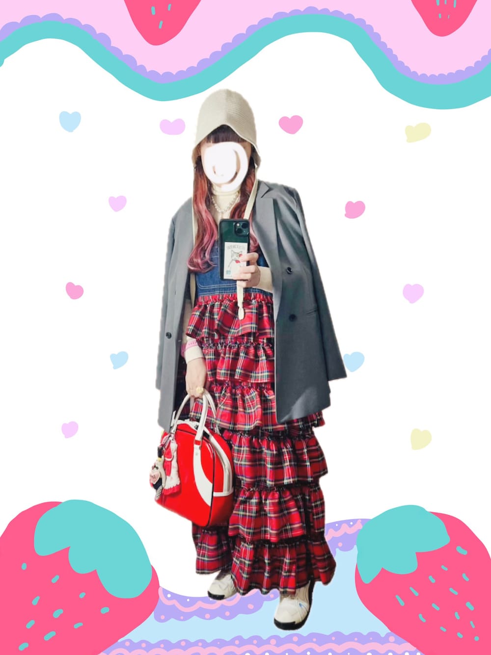 レッド系のジャンパースカート、グレー系のテーラードジャケット、レッド系のボストンバッグを着用したレディースの冬コーディネートの3枚目の写真