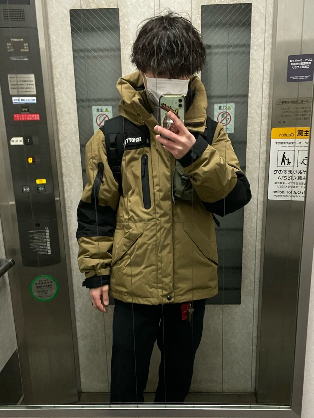 その他のダウンジャケット/コートを着用したメンズの冬コーディネートの2枚目の写真