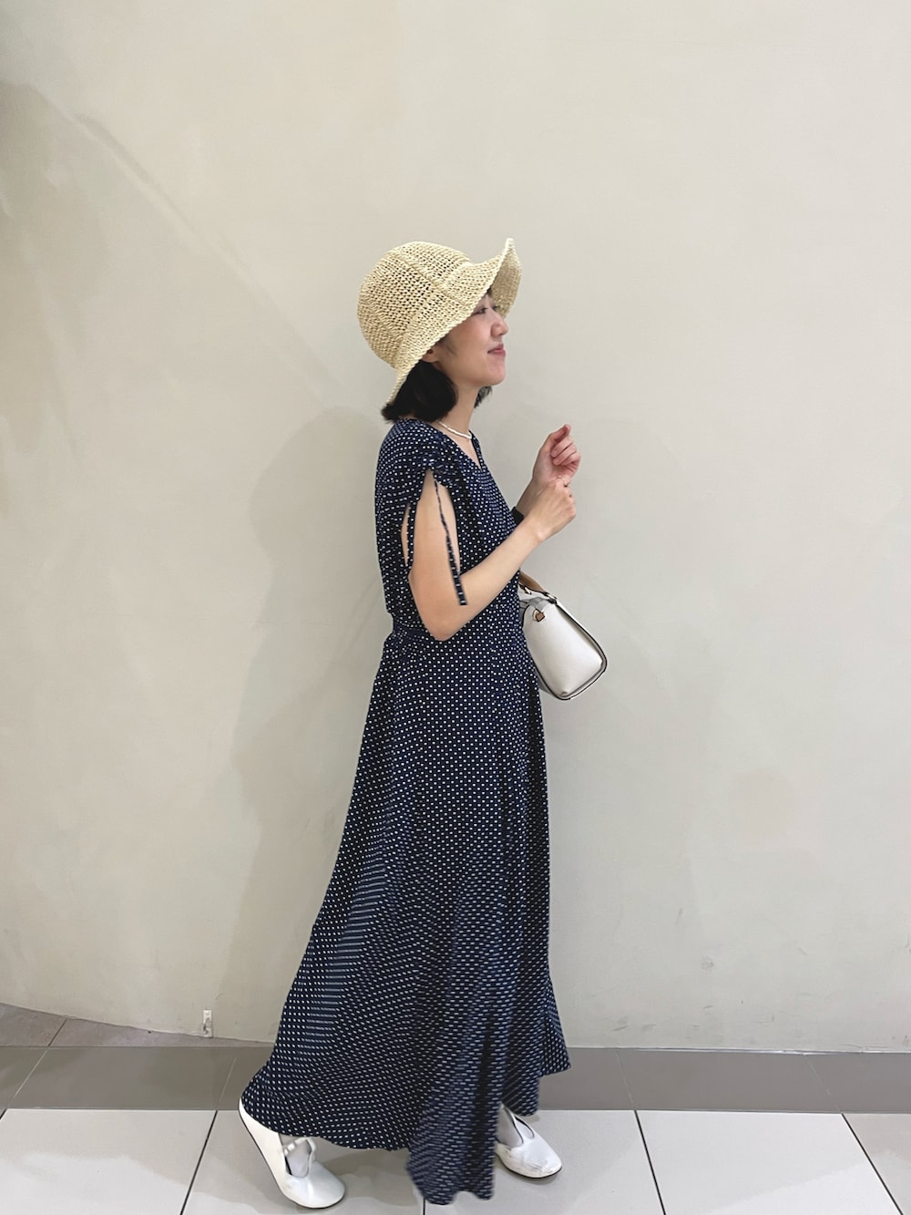 その他のワンピースを着用したレディースの春コーディネートの3枚目の写真