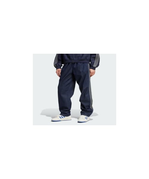 adidas（アディダス）の「adidasアディカラー ルーズ トラックパンツ