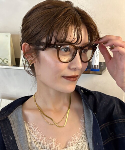 DouDou(ドゥドゥ)の「【OKOCHI企画】調光/ボリュームオーバルサングラス(ファッション雑貨・レディース・ブラウン/ブラック・F)」の1枚目の写真