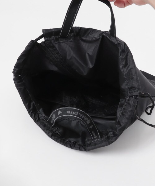 EKAL(エカル)の「and wander CRISPY RIP DRAWSTRING BAG(バックパック/リュック・レディース・BLACK/KHAKI・One)」の8枚目の写真