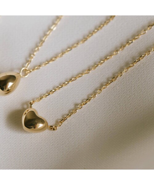 Ops.（オプス）の「K18 ゴールドネックレス ハート エッグ 豆 MOLLICA NECKLACE -モリカ ネックレス-（ネックレス・レディース・イエローゴールド エッグ(K18)/イエローゴールド ファーべ(豆)(K18)/イエローゴールド ハート(K18)・ONE SIZE）」の13枚目の写真