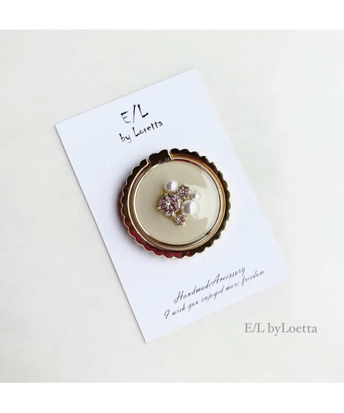 A.D.G(エーディージー)の「スマホ Ring color bijou Ⅱ(Ivory)(イヤリング・レディース・その他・FREE)」の1枚目の写真