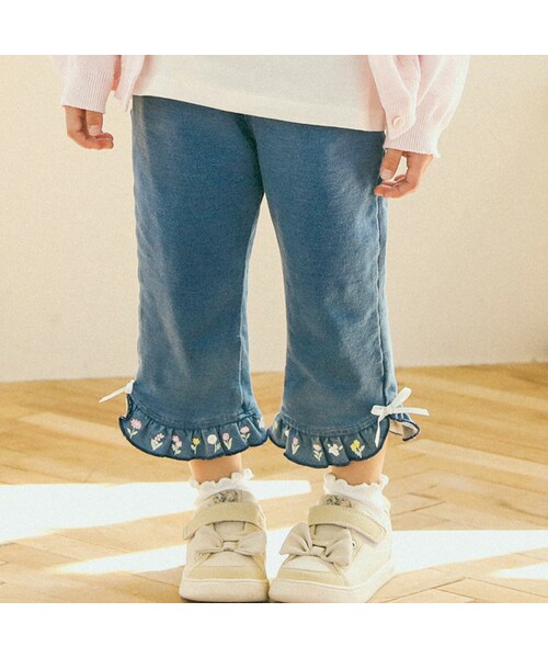 SLAP SLIP(スラップスリップ)の「裾フリルお花プリント7分丈パンツ(80~130cm)(デニムパンツ・キッズ・ブルー/その他・110)」の1枚目の写真