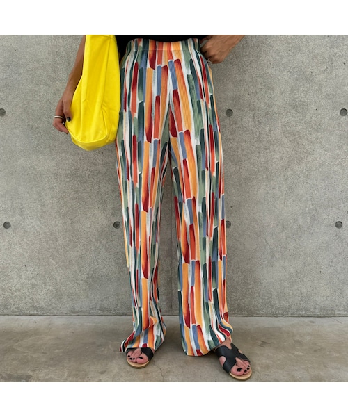 copine(コピン)の「カラフルペイント総柄プリーツパンツ(その他パンツ・レディース・カラフル・ワンサイズ)」の1枚目の写真