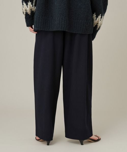 Curensology（カレンソロジー）の「ダブルクロスツータックパンツ