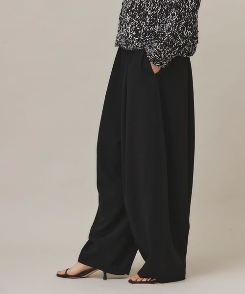 Curensology（カレンソロジー）の「ダブルクロスドロストパンツ