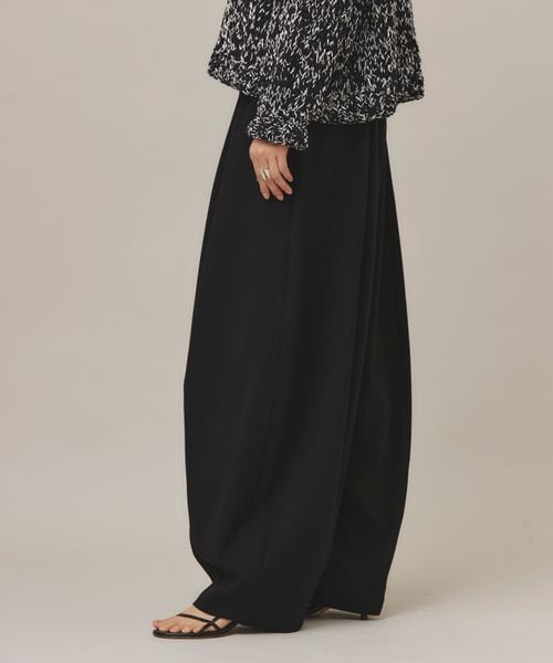 Curensology（カレンソロジー）の「ダブルクロスドロストパンツ