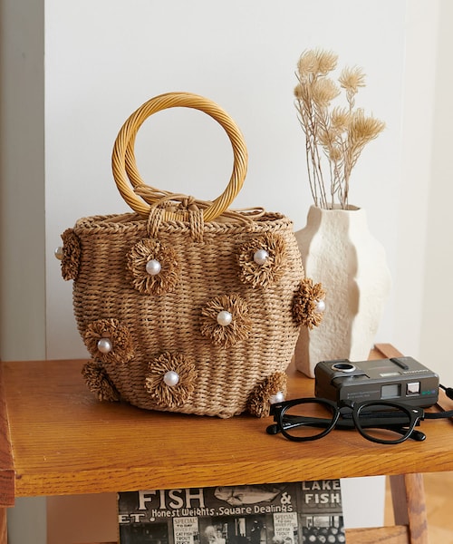 DISCOAT（ディスコート）の「フラワーモチーフ雑材バッグ（かごバッグ