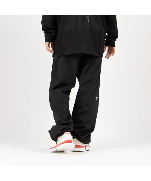 Reebok（リーボック）の「KANGHYUK ロゴ トラックパンツ / STITCHED