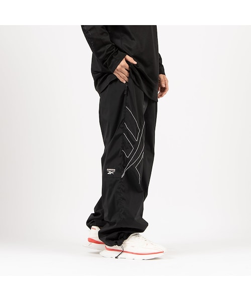Reebok（リーボック）の「KANGHYUK ロゴ トラックパンツ / STITCHED