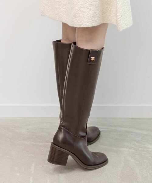 RANDA（ランダ）の「晴雨兼用 モノグラムゴールドパーツロングブーツ