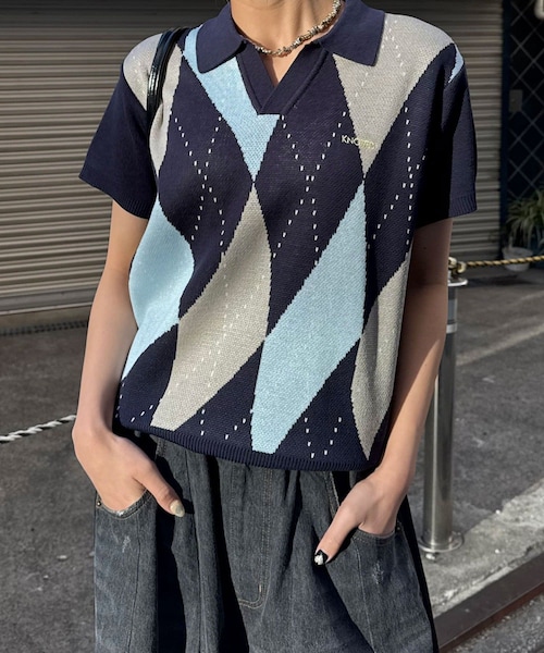 CIAOPANIC(チャオパニック)の「アーガイルスキッパーサマーニットポロシャツ(ポロシャツ・レディース・ネイビー/オレンジ/イエロー/ブラック・S/M/L)」の1枚目の写真