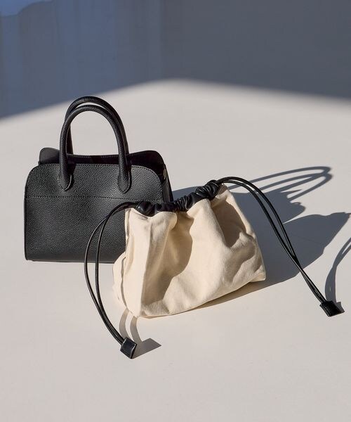 Andemiu（アンデミュウ）の「スクエアキンチャクBAG（バッグ・ホワイト(06)/ブラック(09)/ブラウン(51)・F）」の2枚目の写真