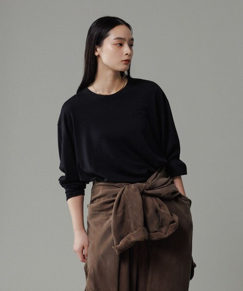 ADAM ET ROPE'(アダムエロペ)の「【NIKKE】ウール天竺 ロングスリーブ ニットT(Tシャツ/カットソー・メンズ・ブラック/ネイビー・L/M)」の1枚目の写真