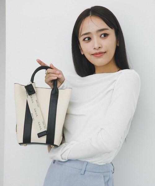 RODE SKO（ロデスコ）の「『別注』AJUGA.×RODE SKO　ロゴリボン付ショルダーバッグ（ショルダーバッグ・レディース・IVORYxBLK/OFFxCAMEL/IVORYxBEG/IVORYxYEL・One）」の10枚目の写真