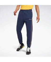 Reebok（リーボック）の「トレーニング エッセンシャルズ パイピング ジョガーズ / Training Essentials Piping Joggers （アウトドア/スポーツ・メンズ）」